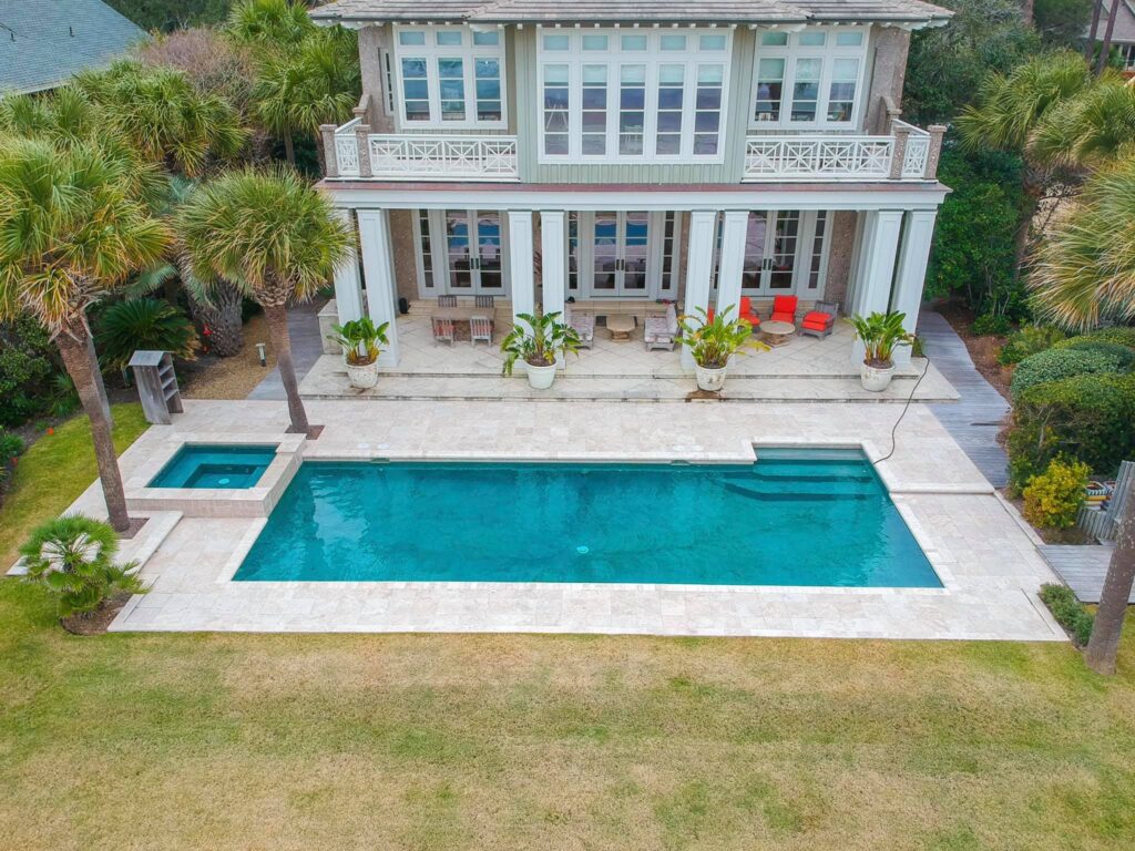 Backyard pool with clean modern design New Wave Pools
